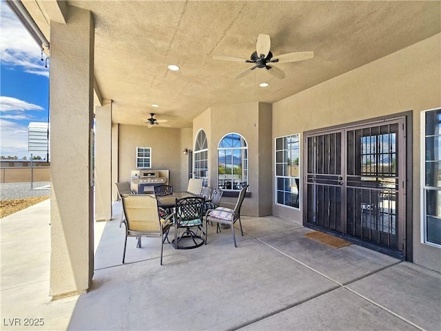 3780 Shawnee Ave, Pahrump, NV 89048 - view of patio / terrace featuring a ceiling fan and outdoor dining space