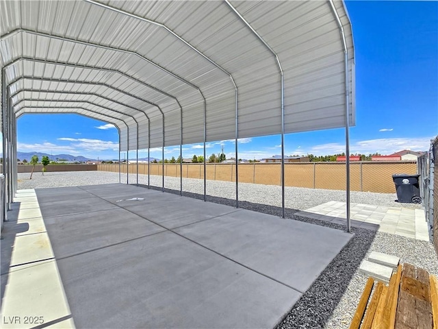 3780 Shawnee Ave, Pahrump, NV 89048 - view of vehicle parking featuring a detached carport and fence
