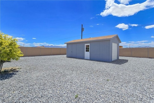 3780 Shawnee Ave, Pahrump, NV 89048 - view of outdoor structure with a fenced backyard and an outdoor structure