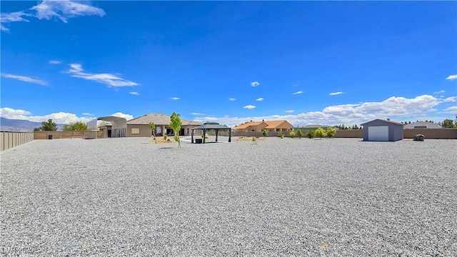 3780 Shawnee Ave, Pahrump, NV 89048 - view of yard featuring a gazebo and fence