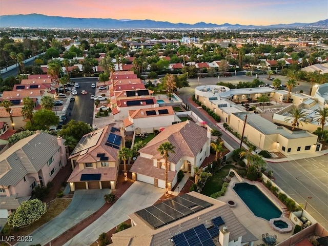 aerial perspective of suburban area with mountains
