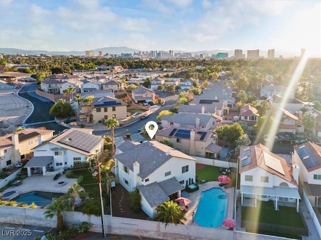 aerial perspective of suburban area with a pool