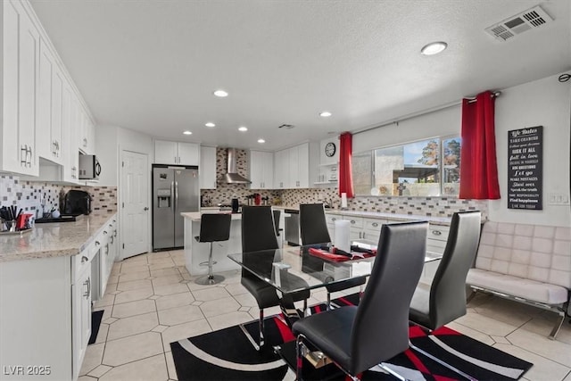 dining area with recessed lighting