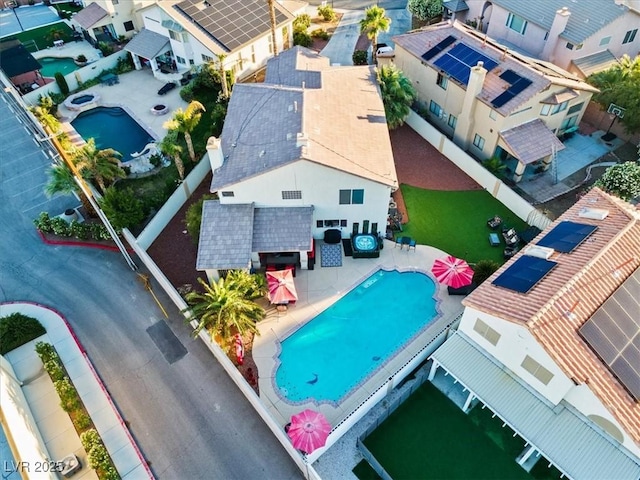 aerial view of residential area featuring a pool area