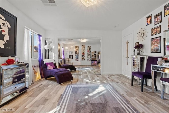 living area featuring light wood-style floors
