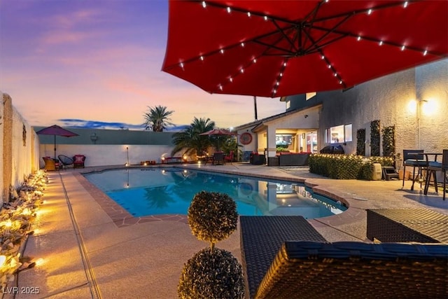 view of pool featuring a patio area
