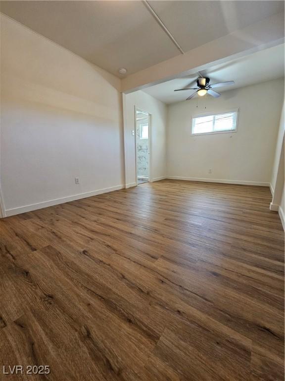 131 Copper St, Henderson, NV 89015 - empty room with a ceiling fan, baseboards, and dark wood finished floors