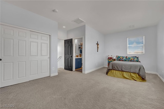 carpeted bedroom featuring baseboards