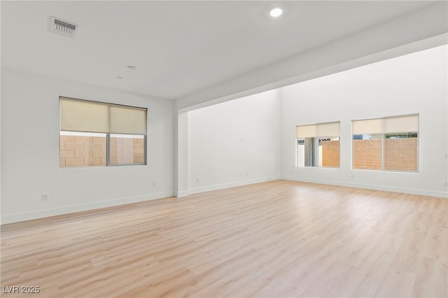 10851 Hanwicke Harbor Ave, Las Vegas, NV 89166 - unfurnished room with light wood finished floors, baseboards, and recessed lighting