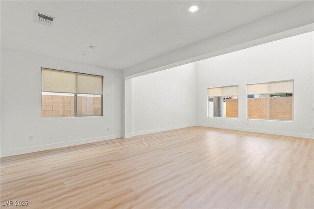 10851 Hanwicke Harbor Ave, Las Vegas, NV 89166 - spare room featuring light wood-style floors and recessed lighting