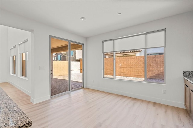 10851 Hanwicke Harbor Ave, Las Vegas, NV 89166 - empty room featuring light wood-type flooring and baseboards