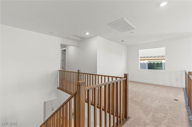 10851 Hanwicke Harbor Ave, Las Vegas, NV 89166 - hall with an upstairs landing, light colored carpet, recessed lighting, and baseboards