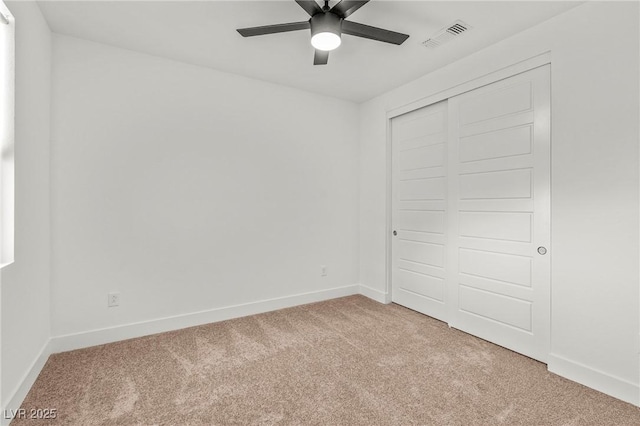 10851 Hanwicke Harbor Ave, Las Vegas, NV 89166 - unfurnished bedroom with carpet floors, baseboards, a closet, and a ceiling fan