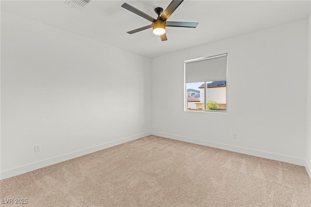 10851 Hanwicke Harbor Ave, Las Vegas, NV 89166 - spare room with light colored carpet, baseboards, and ceiling fan