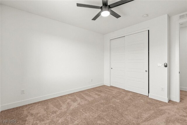 10851 Hanwicke Harbor Ave, Las Vegas, NV 89166 - unfurnished bedroom featuring carpet floors, a closet, and a ceiling fan