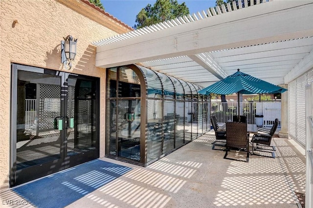 view of patio featuring a pergola