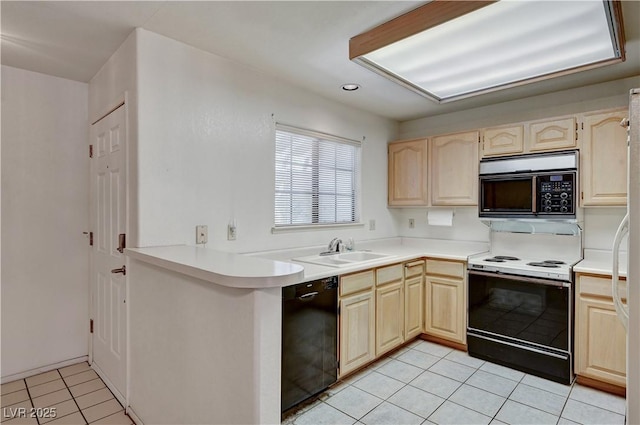 kitchen featuring black appliances, a sink, light brown cabinets, light tile patterned floors, and recessed lighting