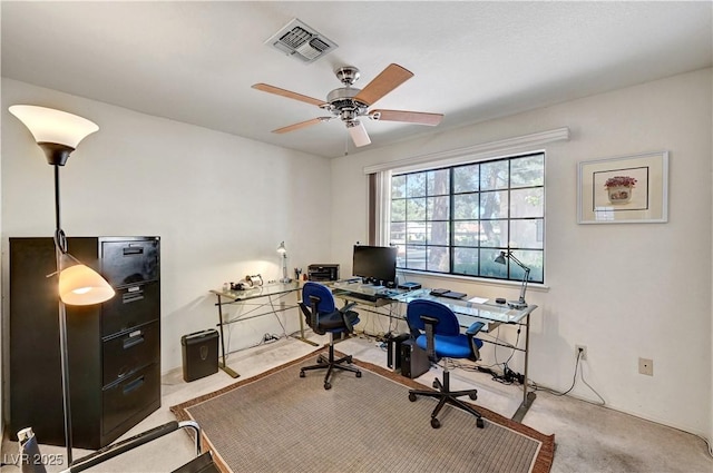 office space featuring carpet floors and ceiling fan