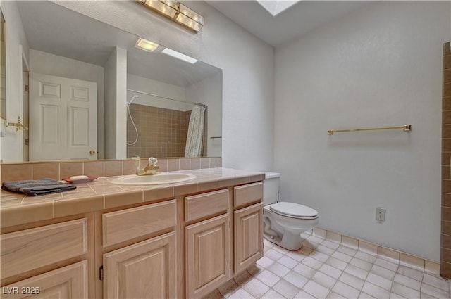 full bathroom with tile patterned floors, a shower with curtain, toilet, and vanity