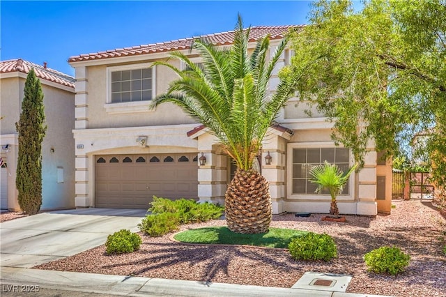 6559 Musette Ave, Las Vegas, NV 89139 - view of front facade featuring driveway, stucco siding, fence, an attached garage, and a tile roof