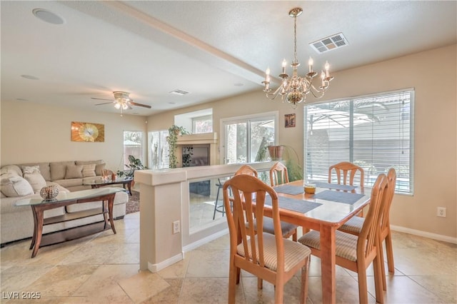 6559 Musette Ave, Las Vegas, NV 89139 - dining area featuring plenty of natural light, a chandelier, baseboards, and ceiling fan