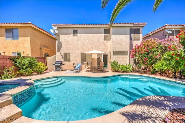 6559 Musette Ave, Las Vegas, NV 89139 - view of pool with a patio, a fenced backyard, grilling area, and a pool with connected hot tub