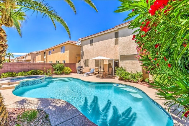 6559 Musette Ave, Las Vegas, NV 89139 - view of swimming pool featuring a patio, fence, and a pool with connected hot tub