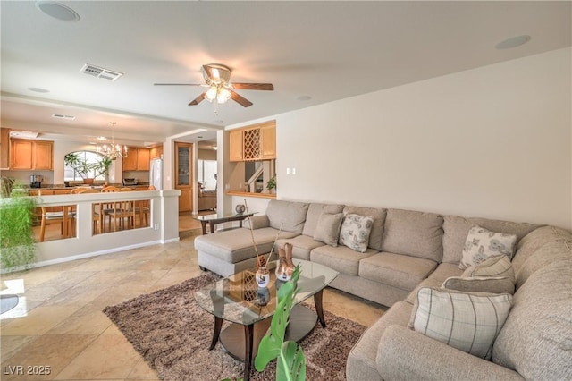6559 Musette Ave, Las Vegas, NV 89139 - living area featuring a chandelier and ceiling fan