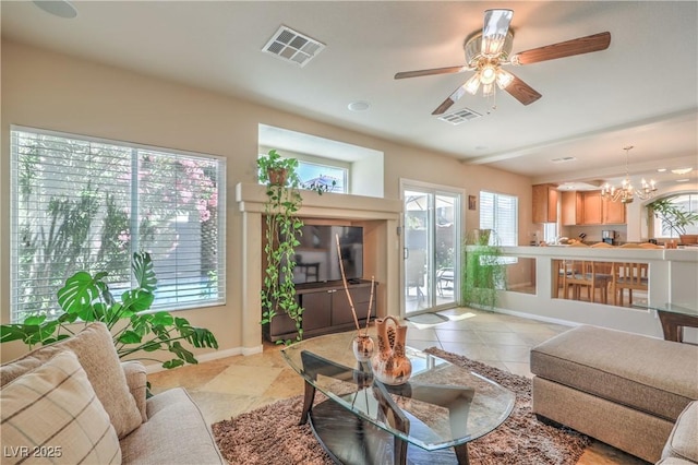 6559 Musette Ave, Las Vegas, NV 89139 - living area featuring plenty of natural light, a chandelier, ceiling fan, and baseboards