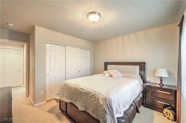 6559 Musette Ave, Las Vegas, NV 89139 - bedroom with light carpet, a closet, and baseboards