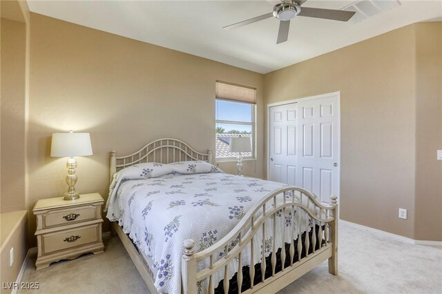 5650 Pleasant Palms St, North Las Vegas, NV 89081 - bedroom featuring light carpet, a closet, a ceiling fan, and baseboards