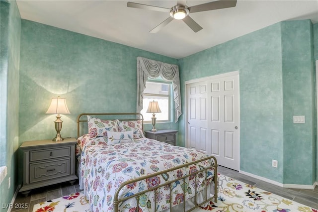 5650 Pleasant Palms St, North Las Vegas, NV 89081 - bedroom featuring wood finished floors, a closet, ceiling fan, and baseboards