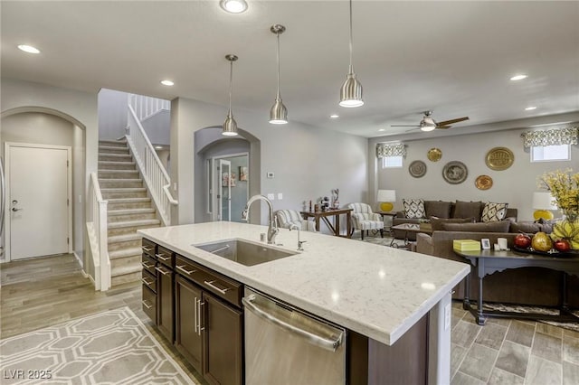 5650 Pleasant Palms St, North Las Vegas, NV 89081 - kitchen with a sink, stainless steel dishwasher, ceiling fan, hanging light fixtures, and recessed lighting