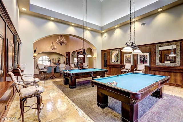 5650 Pleasant Palms St, North Las Vegas, NV 89081 - recreation room featuring arched walkways, a towering ceiling, billiards, and recessed lighting