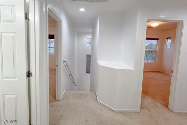 9148 Alluring Ave, Las Vegas, NV 89149 - corridor with an upstairs landing, carpet floors, healthy amount of natural light, baseboards, and recessed lighting