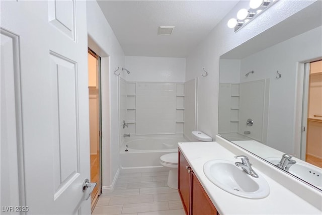 9148 Alluring Ave, Las Vegas, NV 89149 - bathroom featuring washtub / shower combination, toilet, vanity, and tile patterned flooring