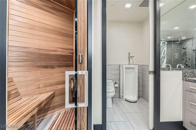 2777 Paradise Rd Unit 2701Ph, Las Vegas, NV 89109 - relaxing sauna / steam room with tile patterned flooring, a wainscoted wall, and recessed lighting