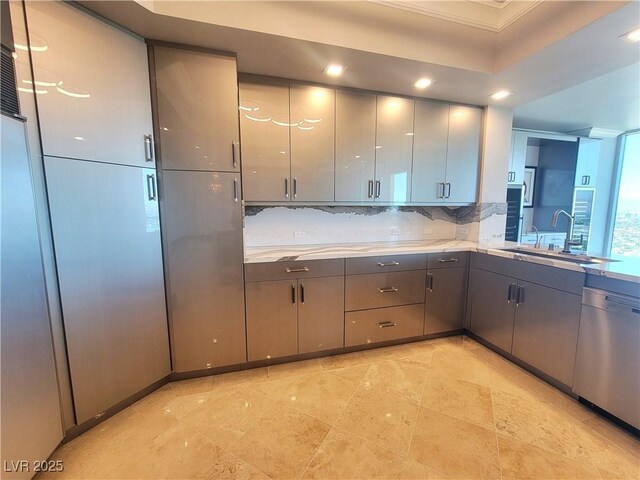 2777 Paradise Rd Unit 2701Ph, Las Vegas, NV 89109 - kitchen featuring dishwasher, crown molding, decorative backsplash, gray cabinetry, and recessed lighting