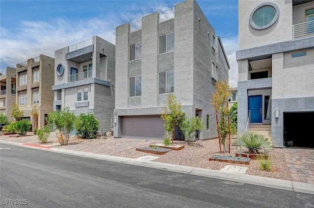 8056 Haywood Estate Ave, Las Vegas, NV 89113 - view of building exterior featuring a garage and driveway
