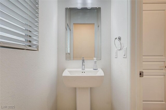 8056 Haywood Estate Ave, Las Vegas, NV 89113 - bathroom with a textured wall
