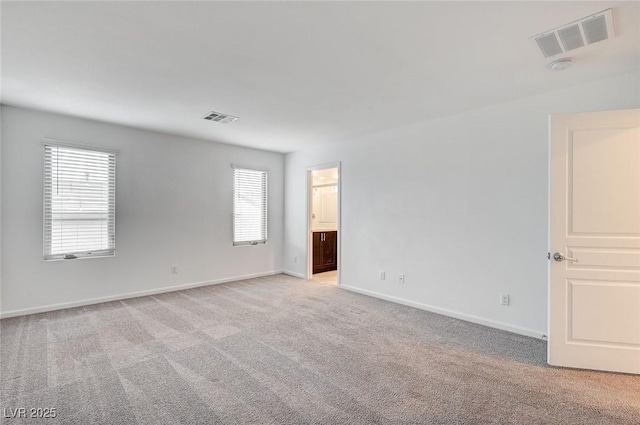 8056 Haywood Estate Ave, Las Vegas, NV 89113 - unfurnished room featuring light carpet and baseboards