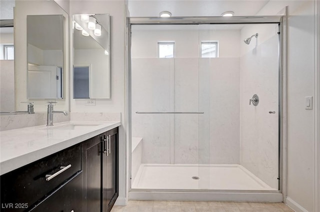 8056 Haywood Estate Ave, Las Vegas, NV 89113 - bathroom featuring a shower stall, plenty of natural light, and vanity