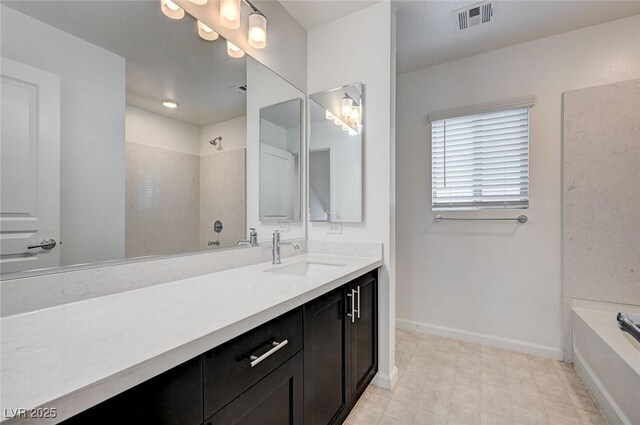 8056 Haywood Estate Ave, Las Vegas, NV 89113 - full bath featuring baseboards, vanity, a shower, and a tub