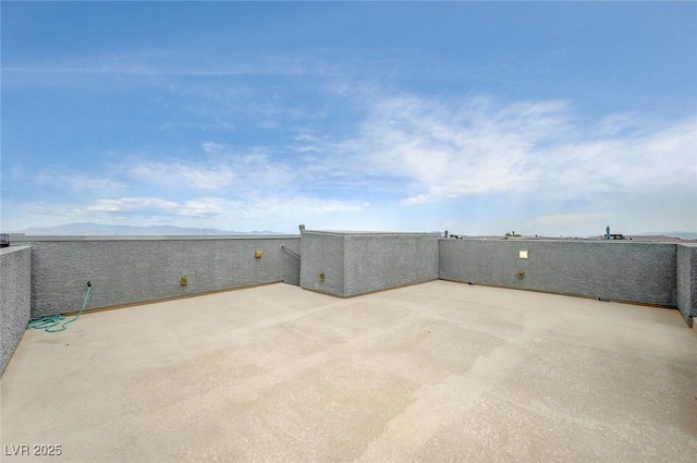 8056 Haywood Estate Ave, Las Vegas, NV 89113 - view of patio / terrace featuring a mountain view