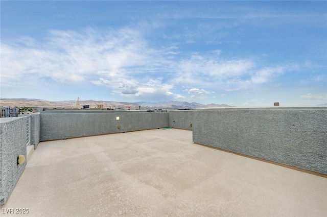8056 Haywood Estate Ave, Las Vegas, NV 89113 - view of patio / terrace with a mountain view