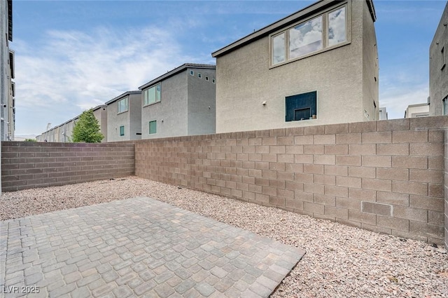 8056 Haywood Estate Ave, Las Vegas, NV 89113 - view of patio / terrace featuring a fenced backyard