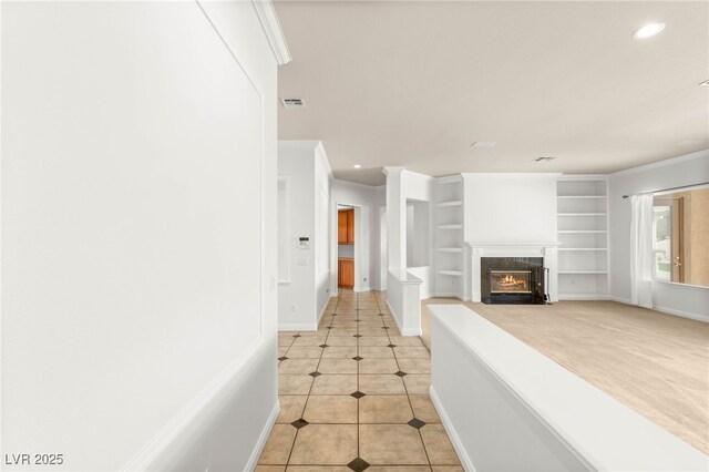 215 Great Gable Dr, Las Vegas, NV 89183 - corridor with baseboards, recessed lighting, light tile patterned floors, built in features, and crown molding