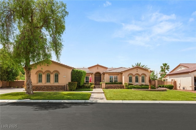 215 Great Gable Dr, Las Vegas, NV 89183 - mediterranean / spanish house featuring stucco siding and a tile roof