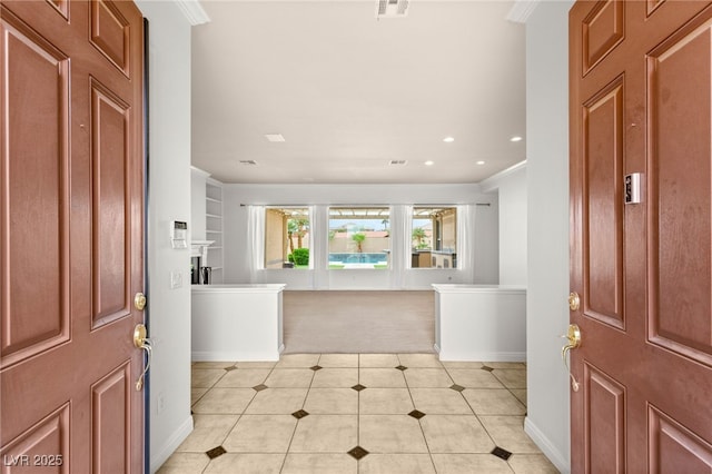 215 Great Gable Dr, Las Vegas, NV 89183 - entryway featuring crown molding, baseboards, light tile patterned flooring, and recessed lighting
