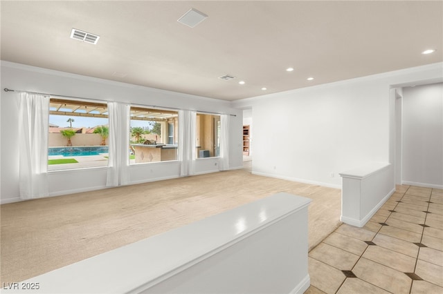 215 Great Gable Dr, Las Vegas, NV 89183 - empty room with recessed lighting, light colored carpet, baseboards, light tile patterned floors, and crown molding